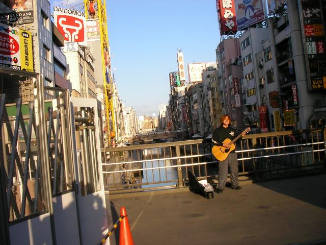 Street musician on Dotonbori bridge