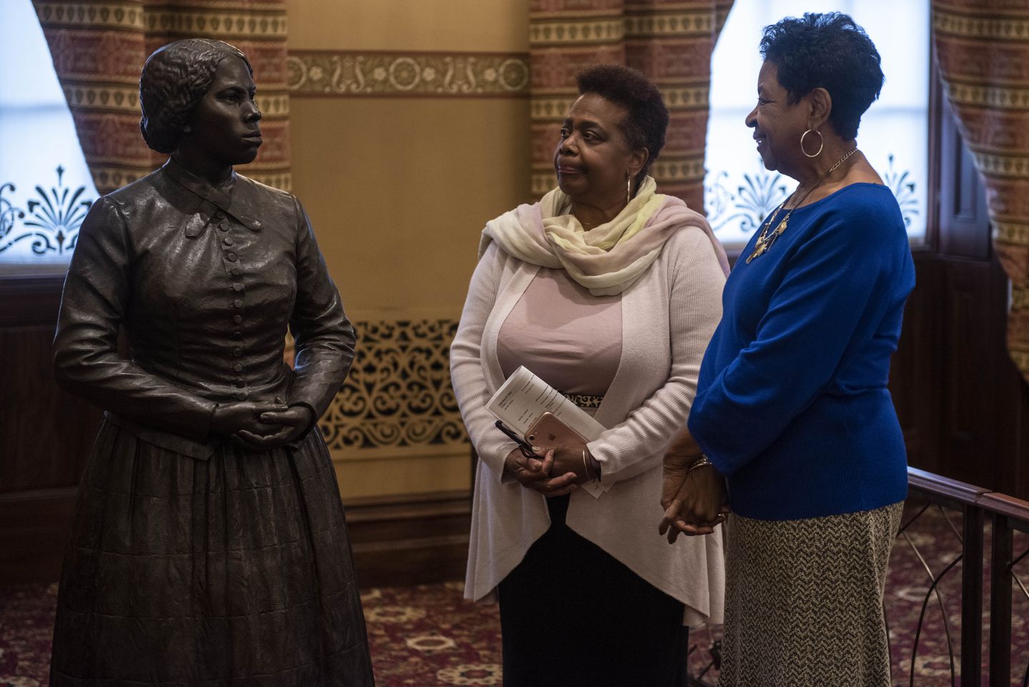 citizens view the Tubman statue